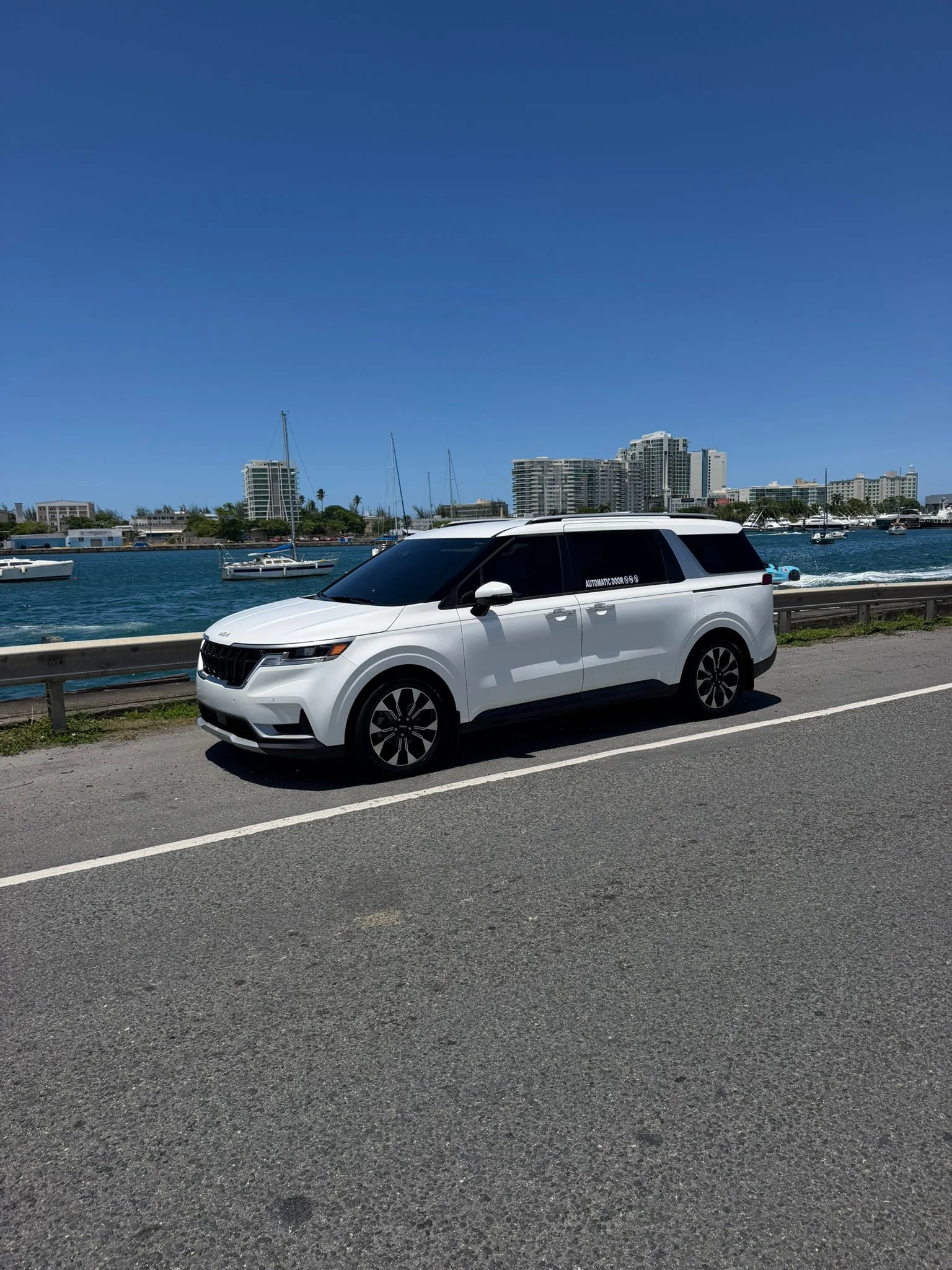 Albert Cruz Private Driver Kia Carnival near the San Juan waterfront for cruise port transfers